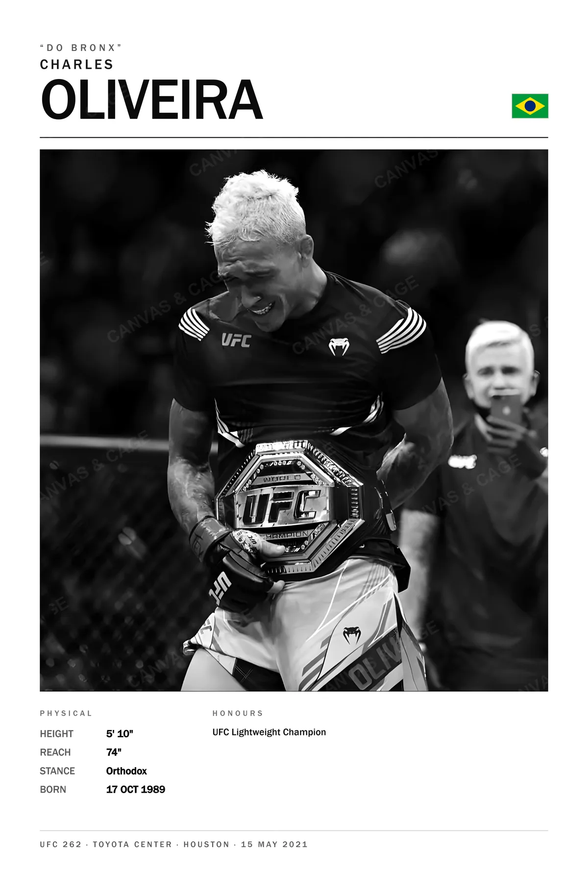 Charles Oliveira — The belt at his waist, head bowed, face screwed up, UFC 262