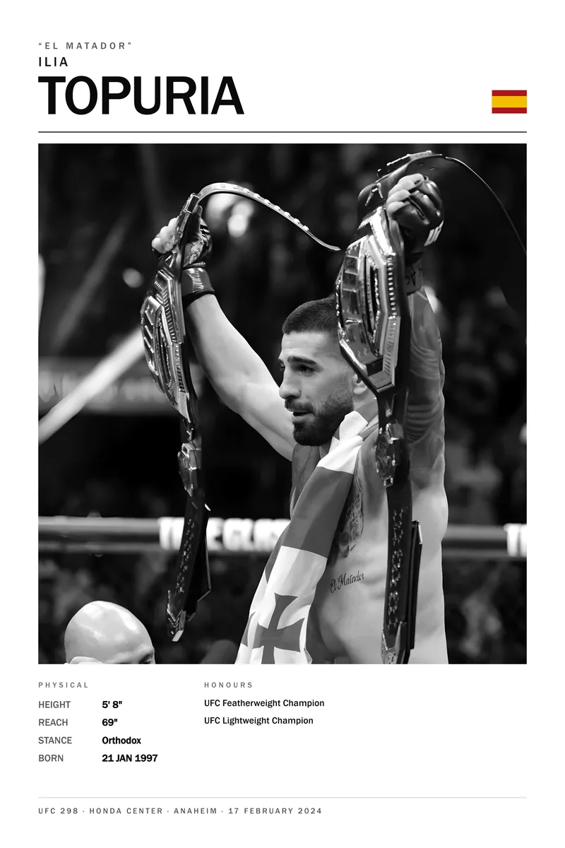 Ilia Topuria — Two UFC belts held overhead, the Georgian flag on his shoulders